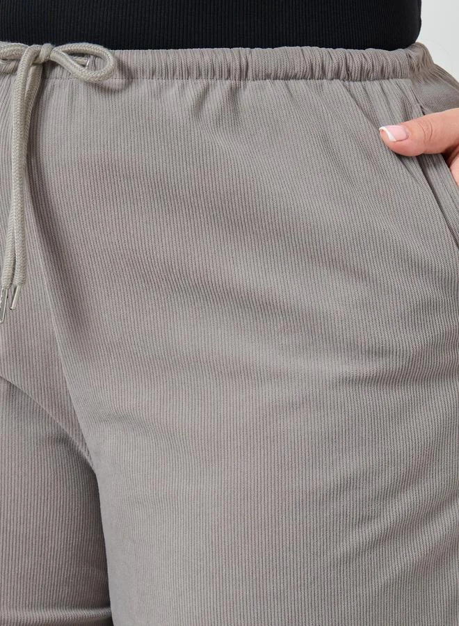 Styli Plus Size Women Grey Wide Leg Trousers